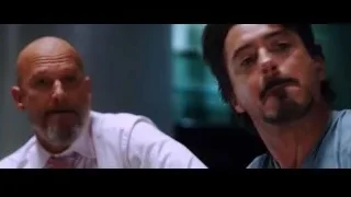 Two bald men in tense conversation — Iron Man