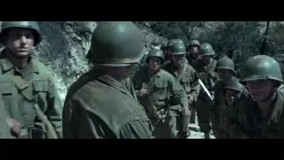 soldiers in uniform with rifles on hillside — Hacksaw Ridge