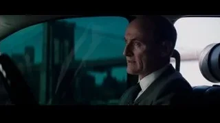 bald man in car looking at city — The Amazing Spider Man 2