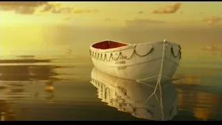 small white boat at sunset — Life of Pi