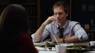 young man eating with chopsticks — Suits