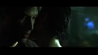 man with wet hair in dark setting — The Matrix