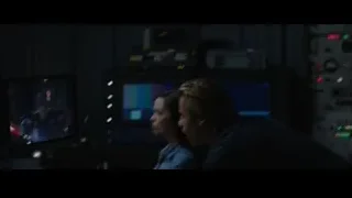 Man and woman in dark control room — Iron Man 3