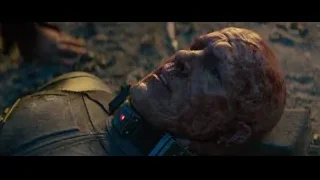 distressed man's face covered in blood — Deadpool 2