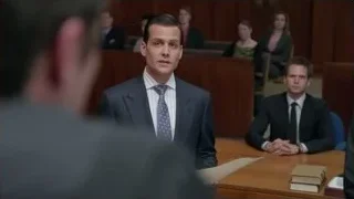 Man in suit speaking in courtroom — Suits