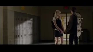 young couple conversing in hallway — The Amazing Spider Man