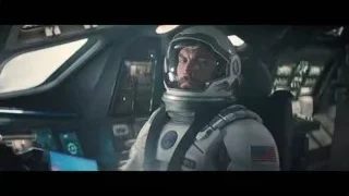 Man in space suit in spaceship cockpit — Interstellar