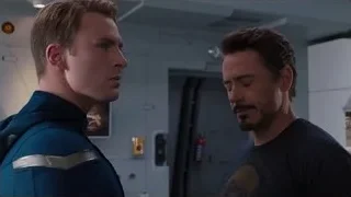 Captain America and Robert Downey Jr. conversing — The Avengers