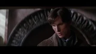 young man with serious face near circular object — Batman
