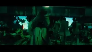 people dancing in dimly lit room — John Wick: Chapter 4