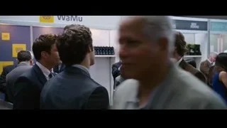 People gathered in room with WAMU booth — The Big Short