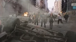 Heroes standing in front of burning car — The Avengers