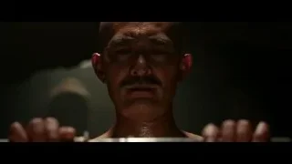 bald man holding a sword — Hacksaw Ridge