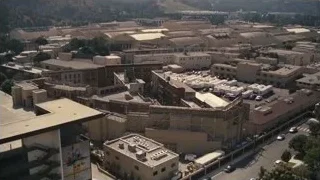 Aerial view of city street — Succession