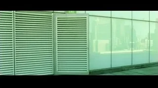 two men in suits exiting building — The Matrix