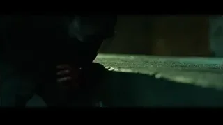 Bloody hand resting on concrete surface — John Wick