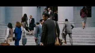 People walking up government building stairs — The Persuit of Happyness