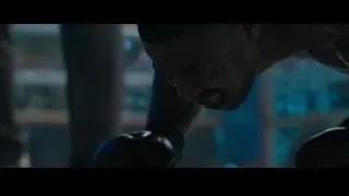 shirtless man shouting in gym — Creed 2