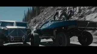man leaning over car in rocky area — Furious Seven