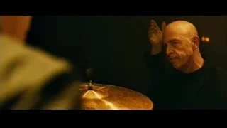 bald man playing cymbal on stage — Whiplash