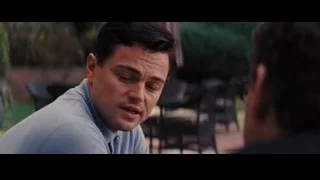 man in blue shirt looking at camera — The Wolf Of Wall Street