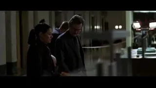 man and woman in dimly lit room — Batman: The Dark Knight
