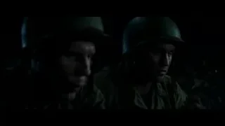 soldiers in dark scene with flames — Hacksaw Ridge