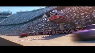 cars racing on motor speedway with spectators — Cars 3
