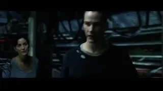 man in dark room with machinery — The Matrix
