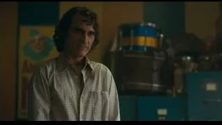 Man with curly hair in room — Joker
