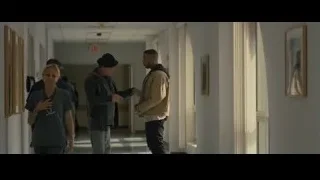 People walking in hospital hallway — Creed 2