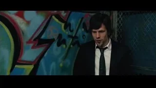 young man in suit in front of graffiti wall — Now You See Me