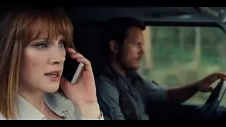 woman on phone with man in car — Jurassic World