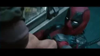 Two masked men fighting at night — Deadpool 2
