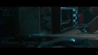 hand reaching into toaster oven in kitchen — Deadpool 2