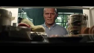elderly man in kitchen with serious expression — Deadpool 2