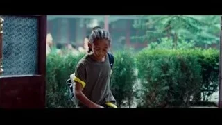 young girl standing in front of door — The Karate Kid