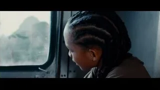 young girl looking out window — The Karate Kid