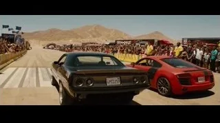 Two cars driving on a race track — Furious Seven