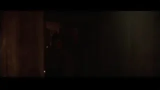 two men in dimly lit wooden room — Batman