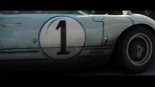 blue Ford sports car on track — Ford v Ferrari