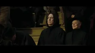 Three people in black robes sitting — Harry Potter and the Goblet of Fire