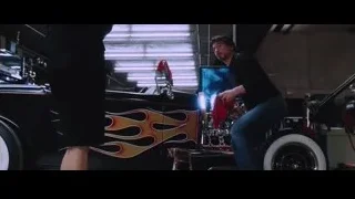 man working on flame painted car — Iron Man