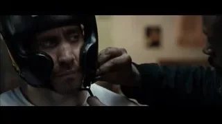 man adjusting boxing helmet in gym — Southpaw