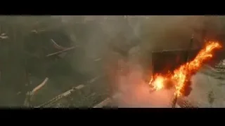 large fire burning in city with boat — Gladiator 2