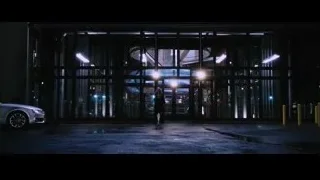 person standing in front of glass door at night — Iron Man