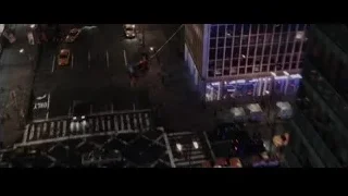 Superhero in red black suit flying over city — The Amazing Spider Man