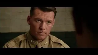man in uniform with gold cross — Hacksaw Ridge