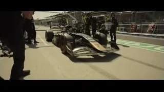 Race car on track in motion — F1