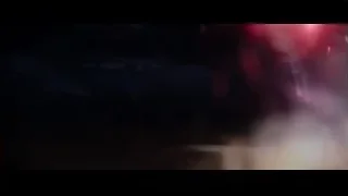 Car driving on wet road at night — Ford v Ferrari